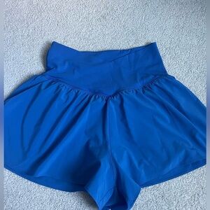 Vibrant blue flowy shorts by aerie size small